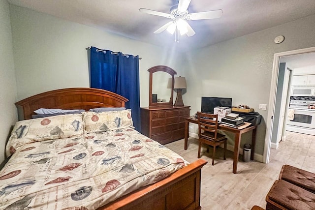 bedroom featuring light hardwood / wood-style flooring and ceiling fan