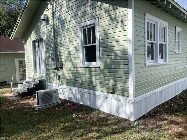 view of property exterior with ac unit