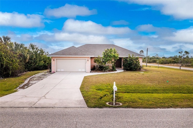 ranch-style house featuring a front yard and a garage