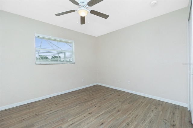 unfurnished room featuring ceiling fan and light hardwood / wood-style flooring