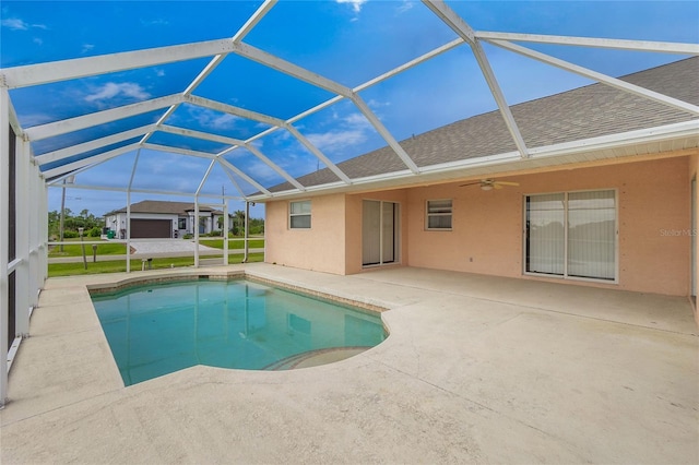 view of pool featuring ceiling fan, a lanai, and a patio