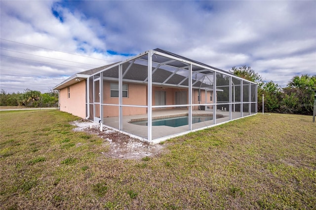 exterior space with a lawn, a lanai, and a patio