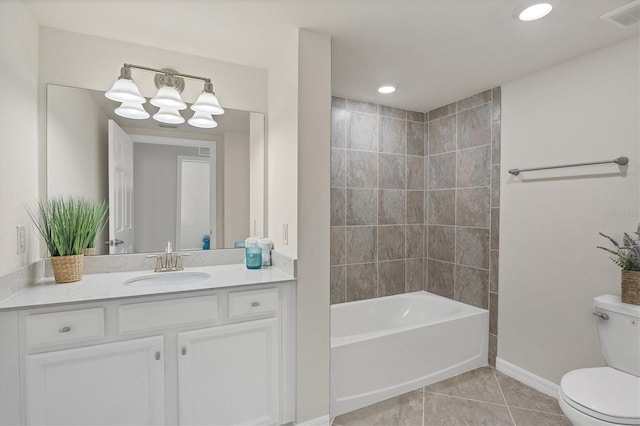 full bathroom with tile patterned floors, a chandelier, toilet, vanity, and tiled shower / bath