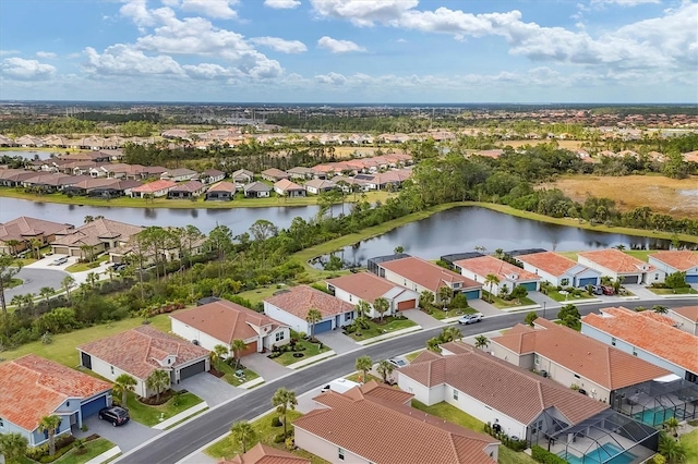 drone / aerial view with a water view