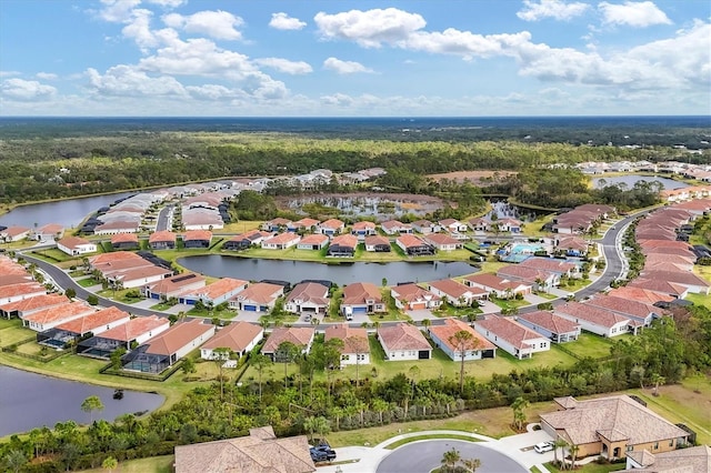 drone / aerial view with a water view