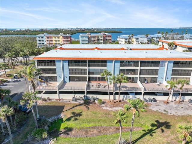 drone / aerial view with a water view