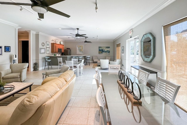 tiled living room with crown molding