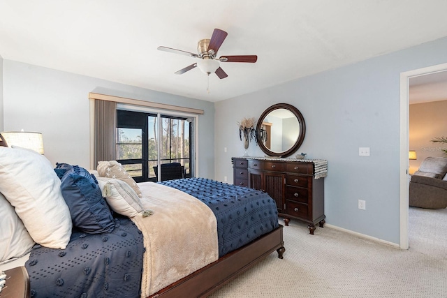 carpeted bedroom with access to exterior and ceiling fan