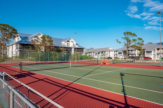 view of tennis court with basketball court