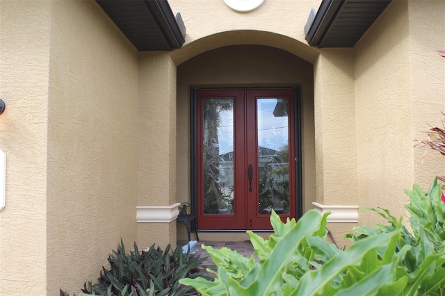 view of exterior entry with french doors