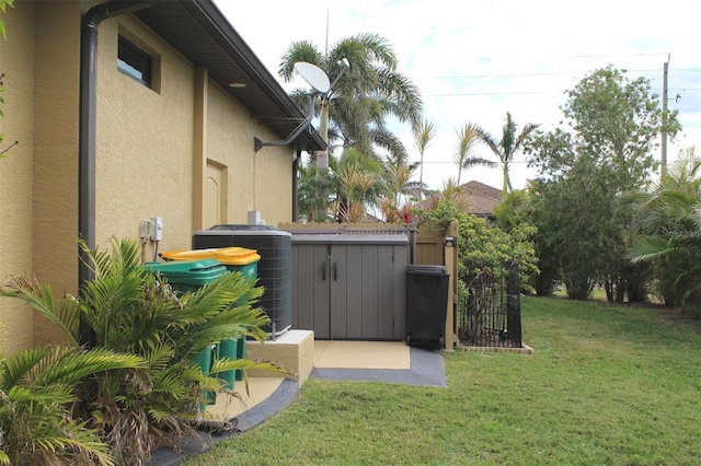 view of yard featuring central AC unit