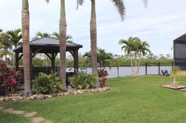 view of yard with a gazebo and a lanai