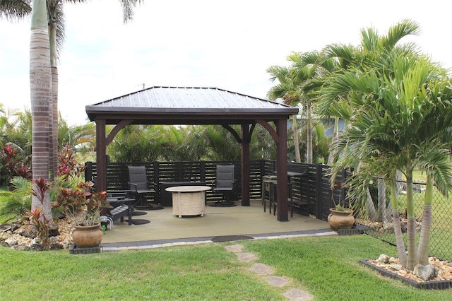 exterior space featuring a gazebo and a deck