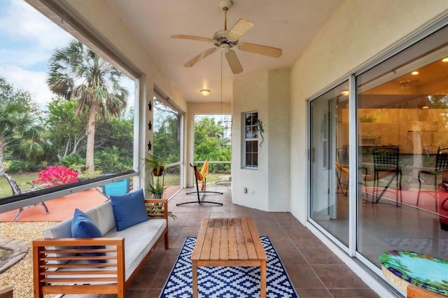 sunroom / solarium with ceiling fan