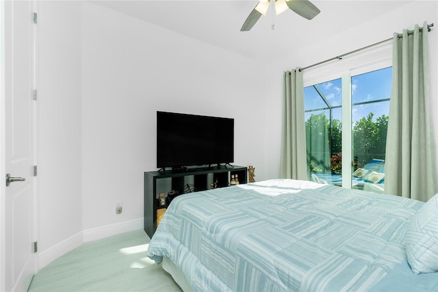 bedroom featuring access to outside and ceiling fan