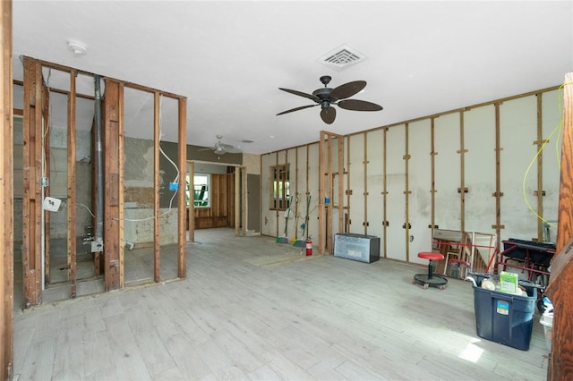 interior space featuring ceiling fan and light wood-type flooring