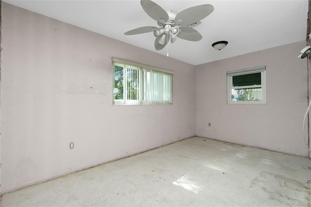 unfurnished room featuring ceiling fan