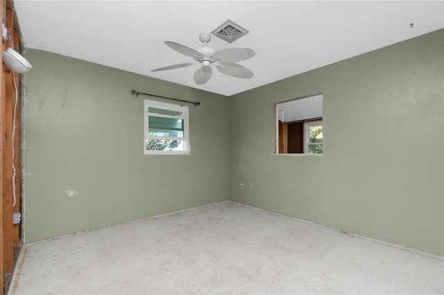 spare room with ceiling fan