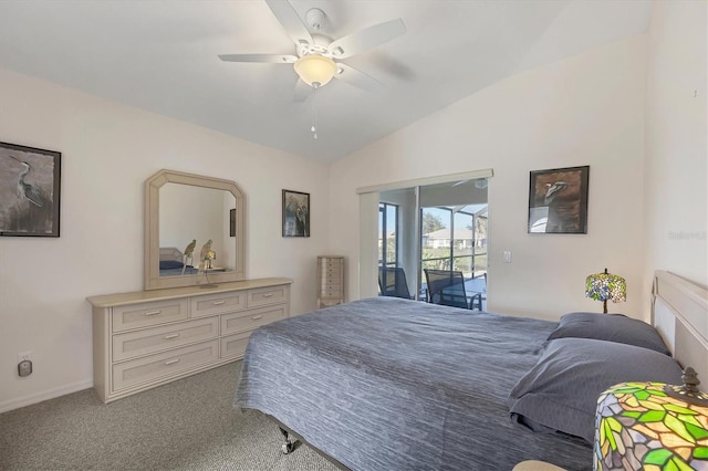 carpeted bedroom featuring access to outside, vaulted ceiling, and ceiling fan