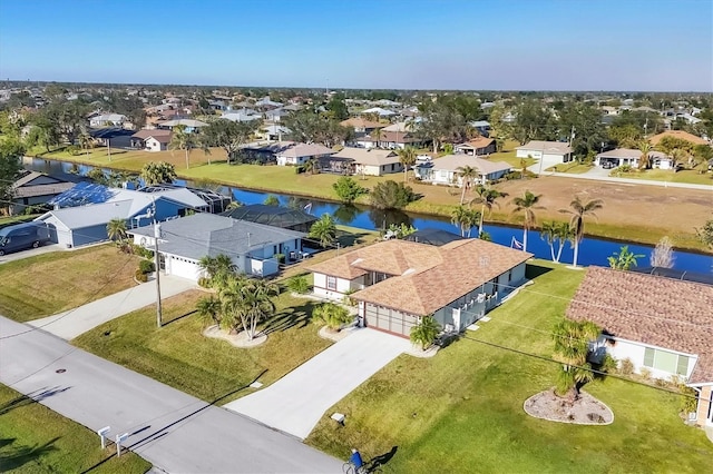 drone / aerial view with a water view