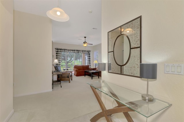 hallway featuring carpet flooring