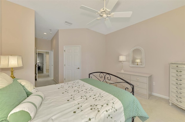 carpeted bedroom featuring vaulted ceiling and ceiling fan