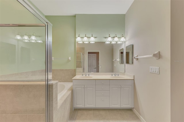 bathroom with tile patterned floors, plus walk in shower, and vanity