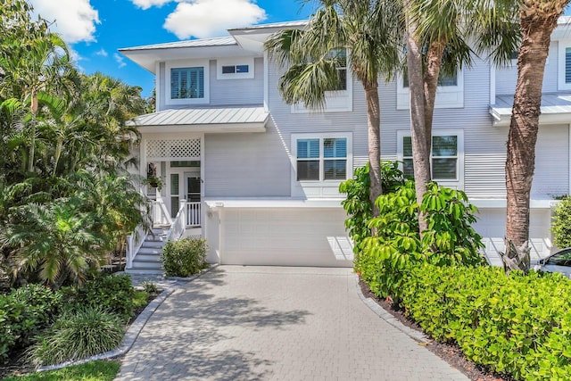 beach home featuring a garage