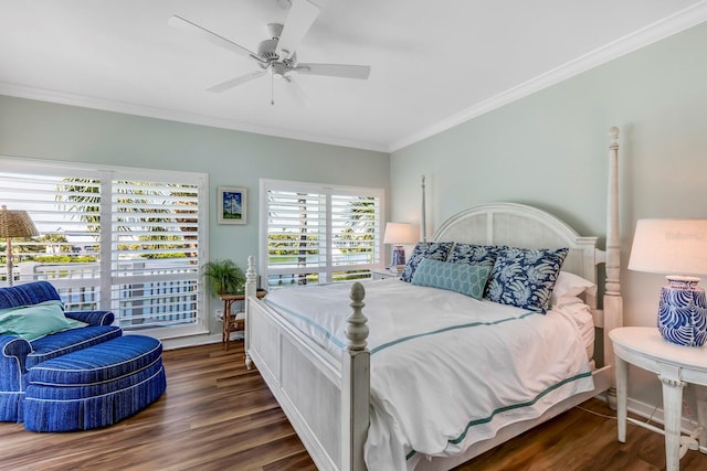 bedroom featuring ceiling fan, crown molding, dark wood-type flooring, and multiple windows