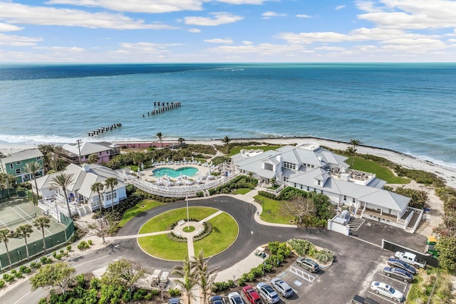 bird's eye view with a view of the beach and a water view