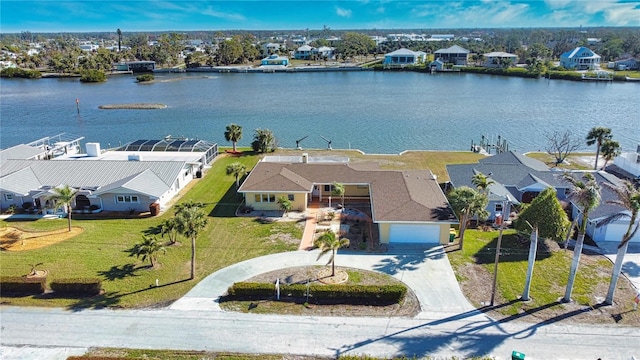 bird's eye view with a water view and a residential view