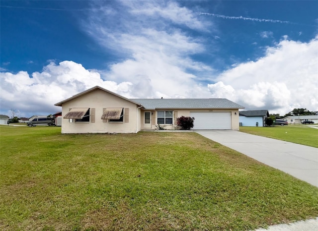 single story home featuring a garage and a front yard