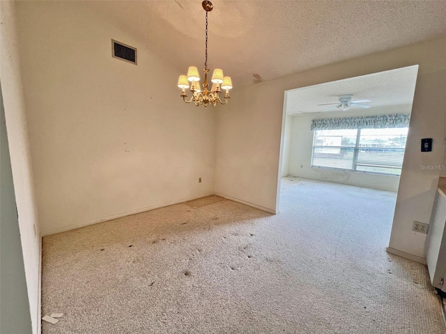 interior space featuring carpet flooring, ceiling fan with notable chandelier, vaulted ceiling, and a textured ceiling