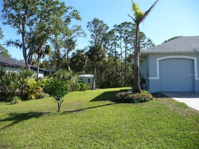 view of yard featuring a storage unit