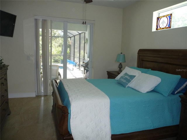 tiled bedroom featuring access to outside