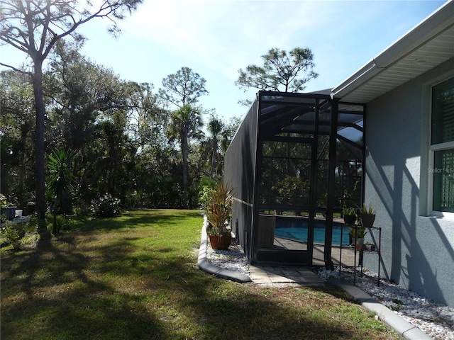 view of yard featuring a lanai