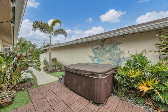 view of patio / terrace featuring a hot tub