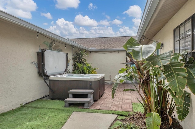 view of patio featuring a hot tub