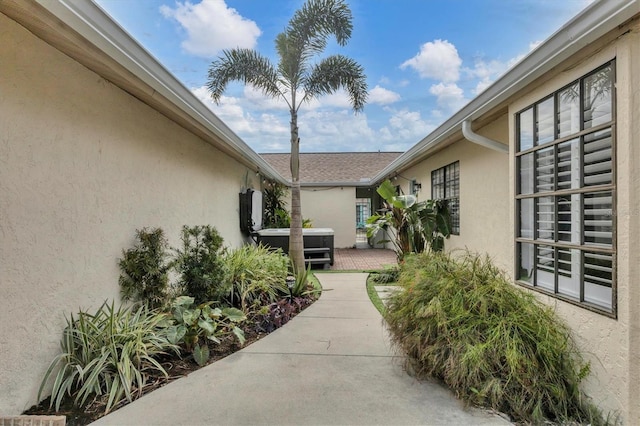 doorway to property with a patio area