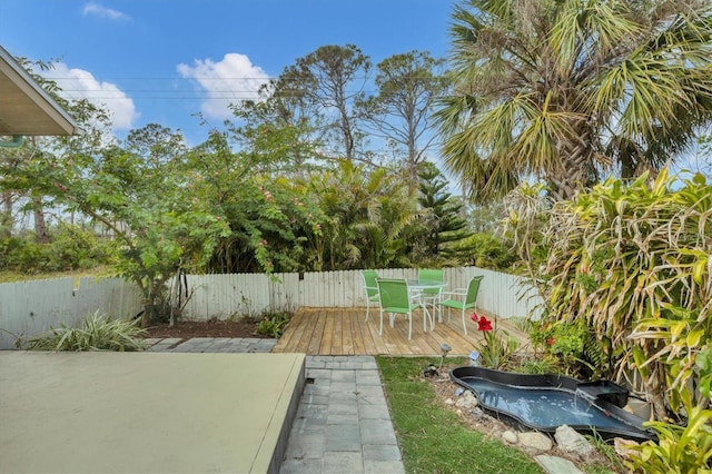 view of yard featuring a deck