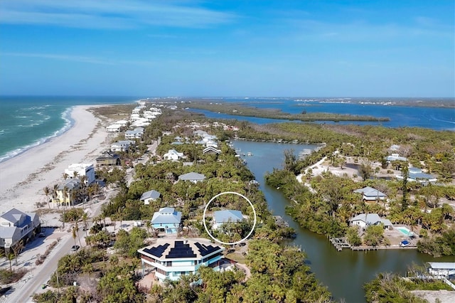 aerial view with a view of the beach and a water view