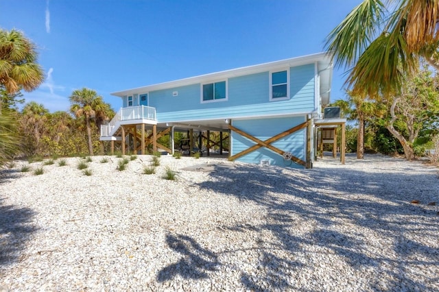 view of front of home featuring a carport