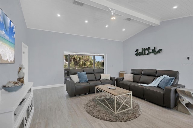 living room with vaulted ceiling with beams and light hardwood / wood-style floors