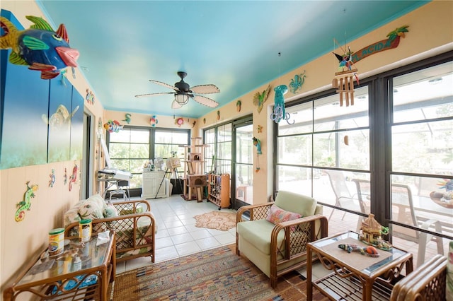 sunroom / solarium with ceiling fan