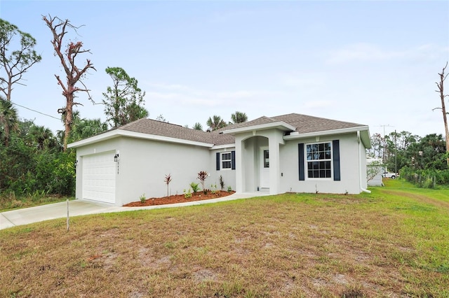 single story home featuring a front lawn and a garage