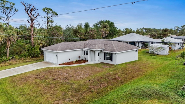 ranch-style home featuring a front lawn and a garage