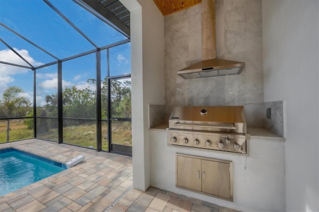 view of pool with glass enclosure, a grill, area for grilling, and a patio area