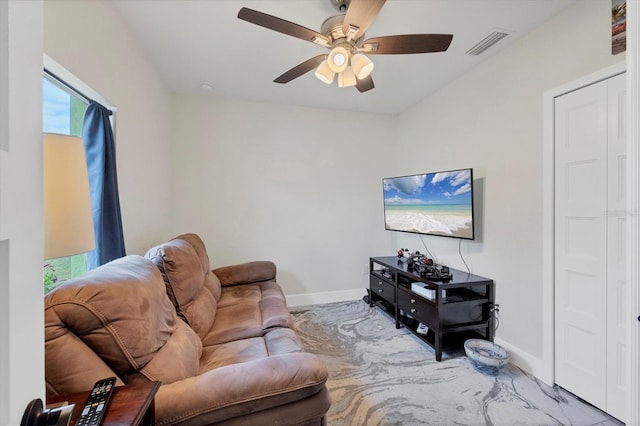 living room featuring ceiling fan