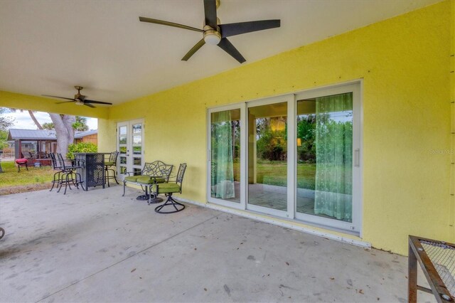 view of patio / terrace featuring ceiling fan