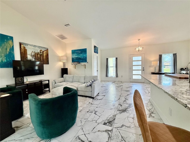 11247 Euler Ave, Englewood, FL 34224 - living area with light marble finish flooring